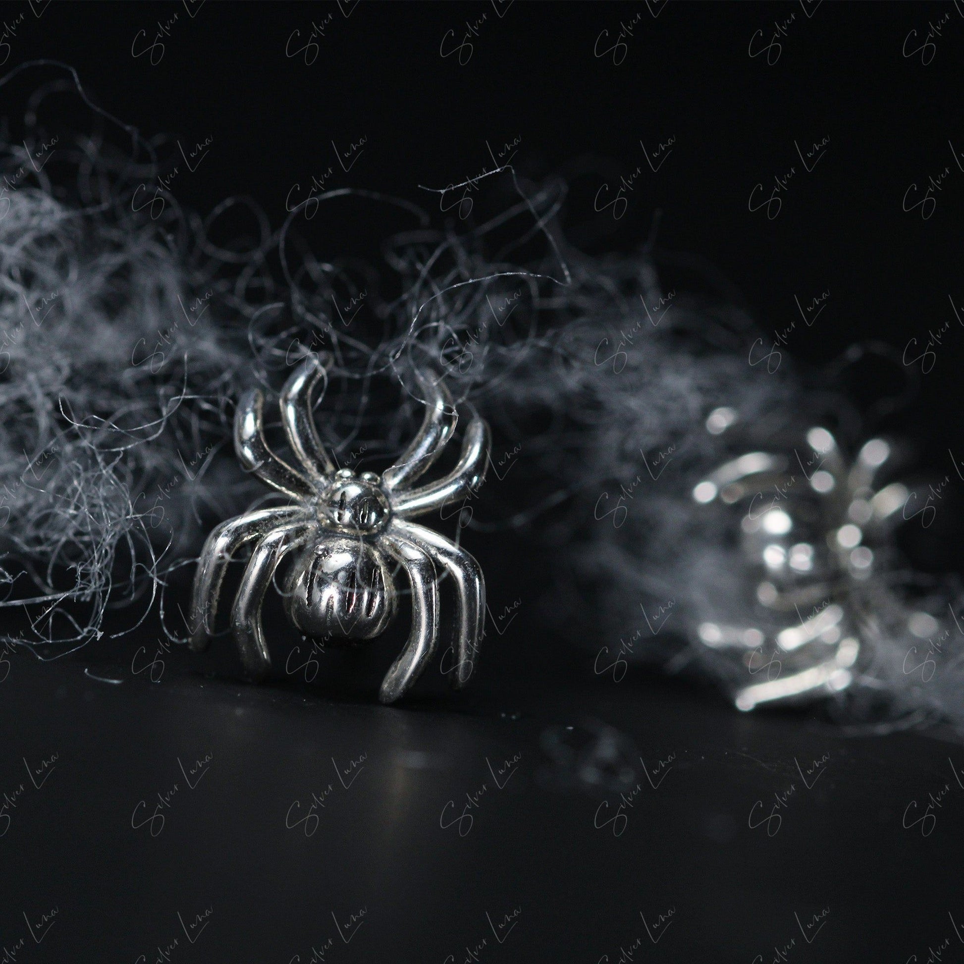 silver spider stud earrings