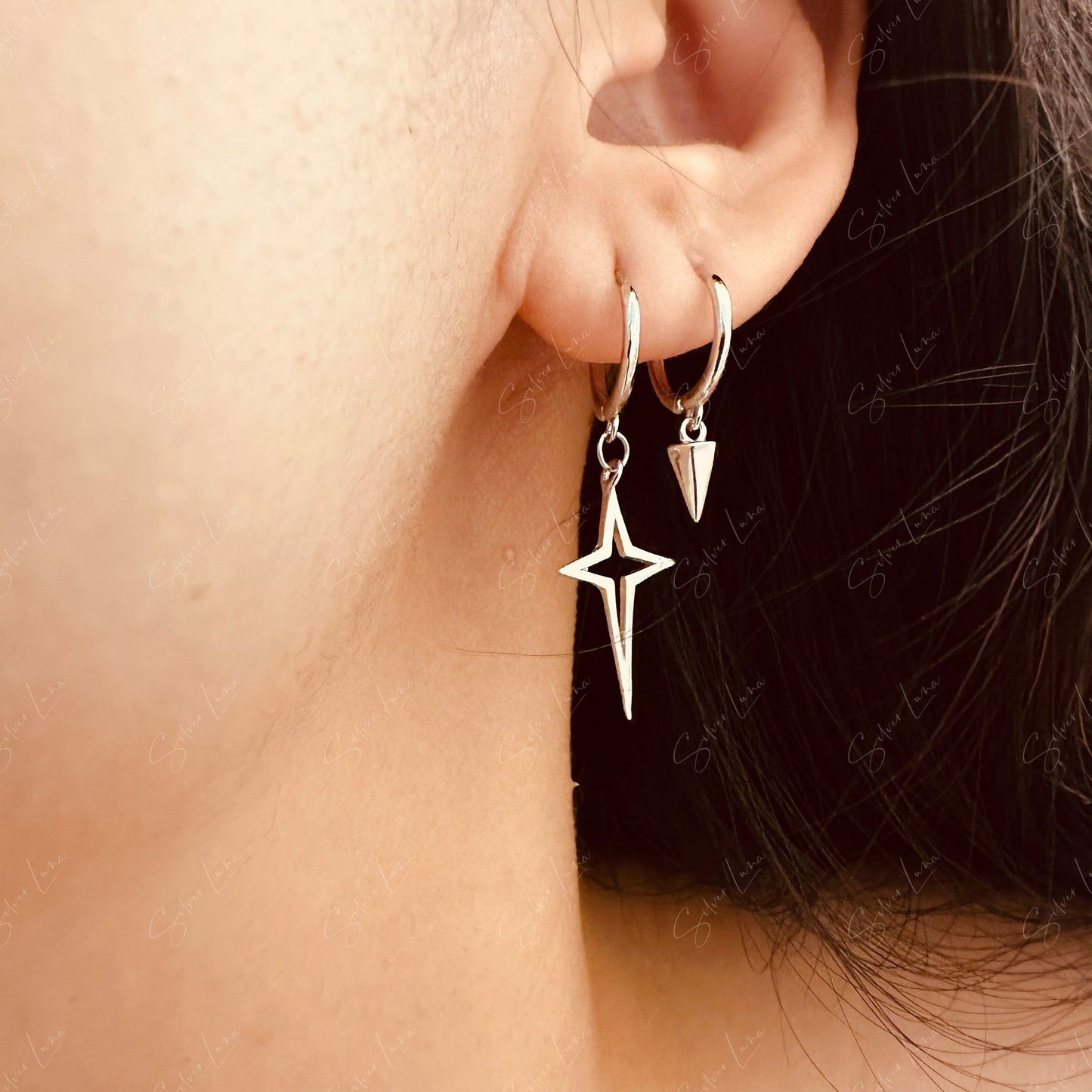 Silver asymmetric star and spike hoop earrings