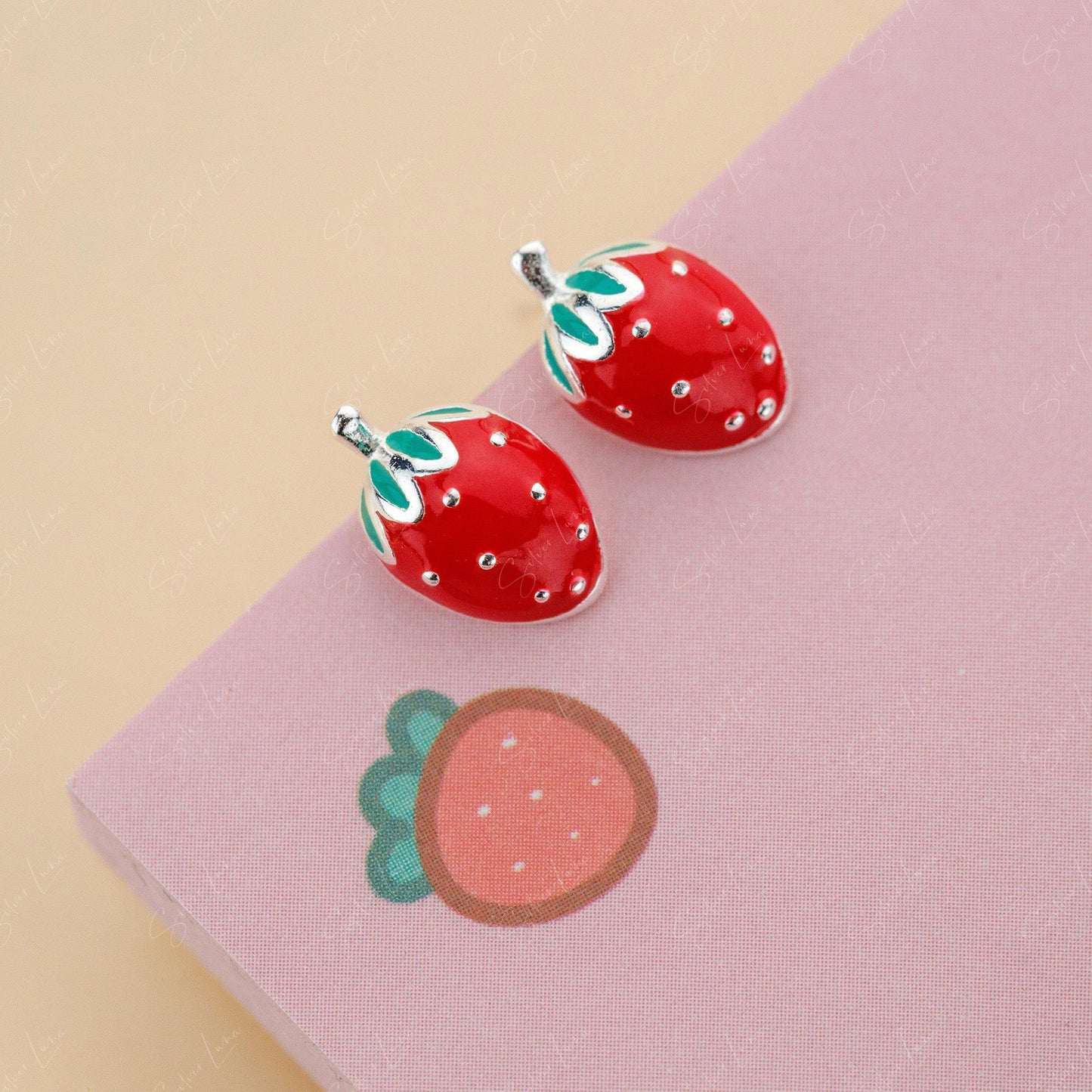 Tiny strawberry stud earrings